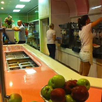 Kiwi Frozen Yogurt - a bowl of apples on a counter - Ice Cream & Frozen Yogurt Near Me - Oldsmar, Florida