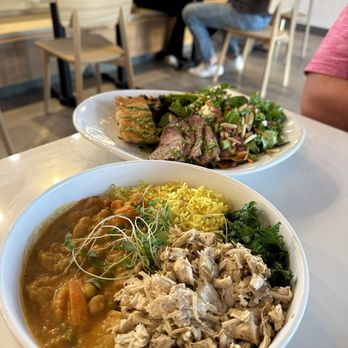 Aubergine Kitchen - Spicy chicken curry bowl & steak plate (with extra steak & salmon added) - Breakfast & Brunch Near Me - Mesa, Arizona