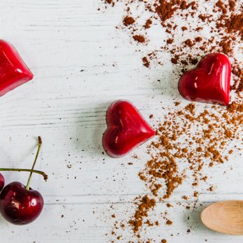 Romanicos Chocolate - cherries and a wooden spoon - Chocolatiers & Shops Near Me - Miami, Florida Romanicos Chocolate - cherries and a wooden spoon - Chocolatiers & Shops Near Me - Miami, Florida