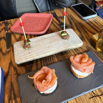 Coqueta - Stuffed Medjool Dates Skewers / Pintxos ($4 each) and Salmon Ahumado ($16) - Spanish Near Me - San Francisco, California Coqueta - Stuffed Medjool Dates Skewers / Pintxos ($4 each) and Salmon Ahumado ($16) - Spanish Near Me - San Francisco, California