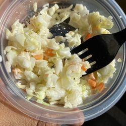 KFC - This is suppose to be coleslaw. It's just cabbage and a few shreds of carrots. It was so dry. There was no dressing.