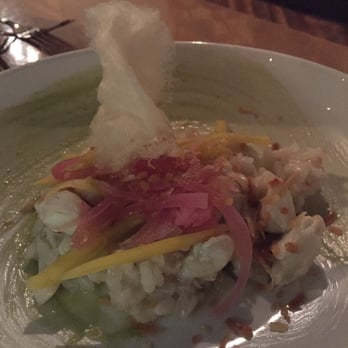 The Fat Snook - Lump crab over coconut risotto with pickled onions and mango topped with sweet Thai chili cotton candy. - Seafood Near Me - Cocoa Beach, Florida The Fat Snook - Lump crab over coconut risotto with pickled onions and mango topped with sweet Thai chili cotton candy. - Seafood Near Me - Cocoa Beach, Florida