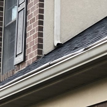 The Exterior Company - Gutter Helmet (non-functioning) after TEC roof job - Roofing Near Me - Lancaster, Pennsylvania The Exterior Company - Gutter Helmet (non-functioning) after TEC roof job - Roofing Near Me - Lancaster, Pennsylvania