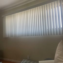 Vertical blinds in main TV room. Cuts off unwanted sun light Vertical blinds in main TV room. Cuts off unwanted sun light