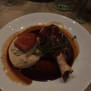 Pylos - cretan-honey braised lamb shank served with giant bean and roasted garlic puree and roasted tomato ($25) - Greek Near Me - New York, New York Pylos - cretan-honey braised lamb shank served with giant bean and roasted garlic puree and roasted tomato ($25) - Greek Near Me - New York, New York