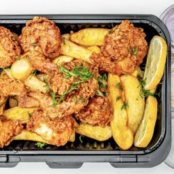 Extra Jumbo Shrimp battered and fried up to perfection with thick steak cut seasoned chips, topped with fresh dill and served with choice of