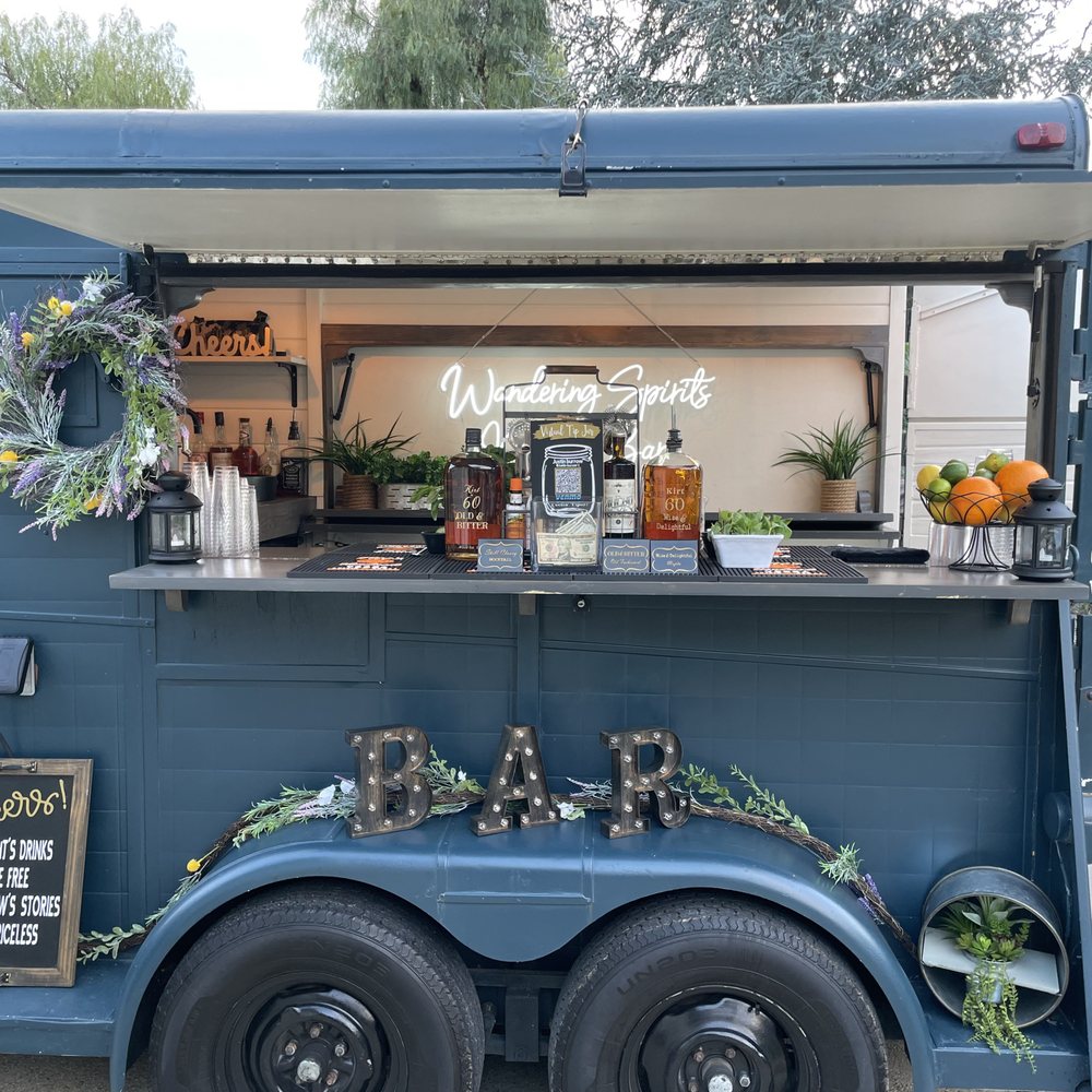 Wandering Spirits Mobile Bar - The bar trailer makes it. It's also light up well when it gets dark - Bartenders Near Me Wandering Spirits Mobile Bar - The bar trailer makes it. It's also light up well when it gets dark - Bartenders Near Me