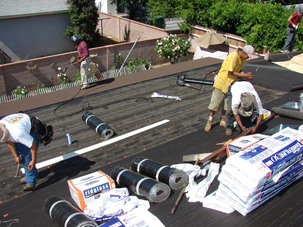 Slide of Husky Roofing