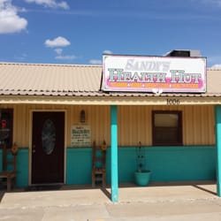 Sandy's Health Hut - Front of the store. Closed on Sunday. Friendly people who work here! I plan to stop by again the next time I'm in town.