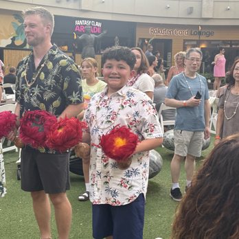 Queens Waikiki Luau - I hear my grandson is participating in one of the activities they had - Dinner Theater Near Me - Honolulu, Hawaii Queens Waikiki Luau - I hear my grandson is participating in one of the activities they had - Dinner Theater Near Me - Honolulu, Hawaii