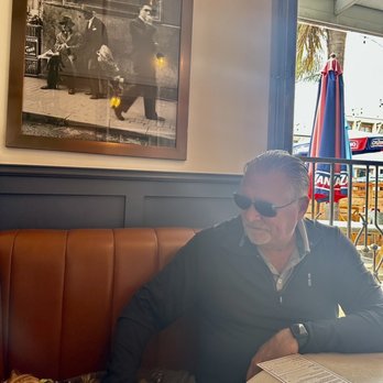 Immigrant Son Caffe - Fur kids enjoying the hospitality - New American Near Me - Ventura, California
