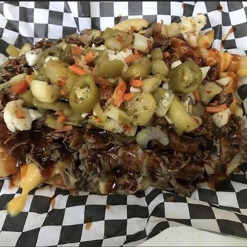 Big Herm's Chicago Style - Gypsy Fries! Crispy Crinkle Cut Fries, Cheddar Cheese, Italian Beef, House BBQ Sauce topped with our Homemade Giardiniera. - Food Trucks Near Me - Matlacha, Florida Big Herm's Chicago Style - Gypsy Fries! Crispy Crinkle Cut Fries, Cheddar Cheese, Italian Beef, House BBQ Sauce topped with our Homemade Giardiniera. - Food Trucks Near Me - Matlacha, Florida