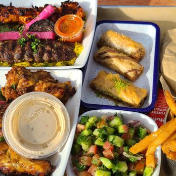 Mazra - Kebab Plate, Chicken Wings, Fresh Arabic Salad, Fries, Raspberry Lemonade, and Baklava. - Middle Eastern Near Me - San Bruno, California Mazra - Kebab Plate, Chicken Wings, Fresh Arabic Salad, Fries, Raspberry Lemonade, and Baklava. - Middle Eastern Near Me - San Bruno, California