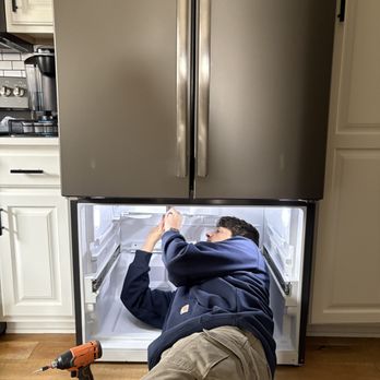 Precision Appliance Repair - Levi, expert technician, fixing a refrigerator - Appliances & Repair Near Me - Archdale, North Carolina Precision Appliance Repair - Levi, expert technician, fixing a refrigerator - Appliances & Repair Near Me - Archdale, North Carolina