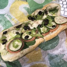 A poorly made sandwich. Wow, is lettuce too expensive? A poorly made sandwich. Wow, is lettuce too expensive?