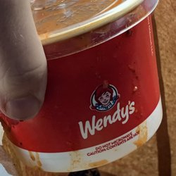 Wendy's - Chili thrown in bag upside down - leaking inside bag and onto car seat..