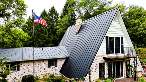 Metal Roofing - At Canton Roofing Company, we're at the forefront of advanced metal roofing solutions. Metal roofing, especially open seam and closed seam variations, not only offer a distinctive aesthetic but also stand as an eco-conscious, energy-saving choice. Our dedication to utilizing the latest techniques in both open seam and closed seam metal roofing guarantees homeowners in Canton and its neighboring areas the highest level of protection combined with contemporary elegance. With our team perpetually refining their expertise, we pledge longevity and resilience with every installation. Step into the future of roofing with our unparalleled metal offerings, and let Canton Roofing Company elevate your home's style and durability.