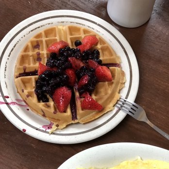 Sawmill Restaurant - Belgian waffle with blueberries and strawberries side of three eggs scrambled and a mocha coffee ;). - American Near Me - Wilmington, North Carolina Sawmill Restaurant - Belgian waffle with blueberries and strawberries side of three eggs scrambled and a mocha coffee ;). - American Near Me - Wilmington, North Carolina