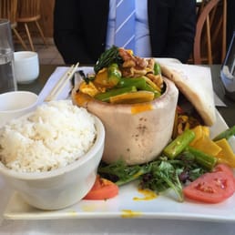 Freshly-cut Whole Coconut with Vegetables and Red Curry