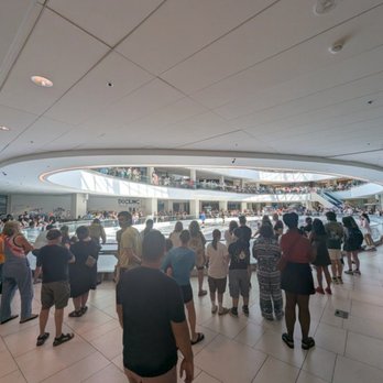 Lloyd Center - Mall goers watching skaters on the last day of Lloyd Center Mall being open, August 2026. - Shopping Centers Near Me - Portland, Oregon