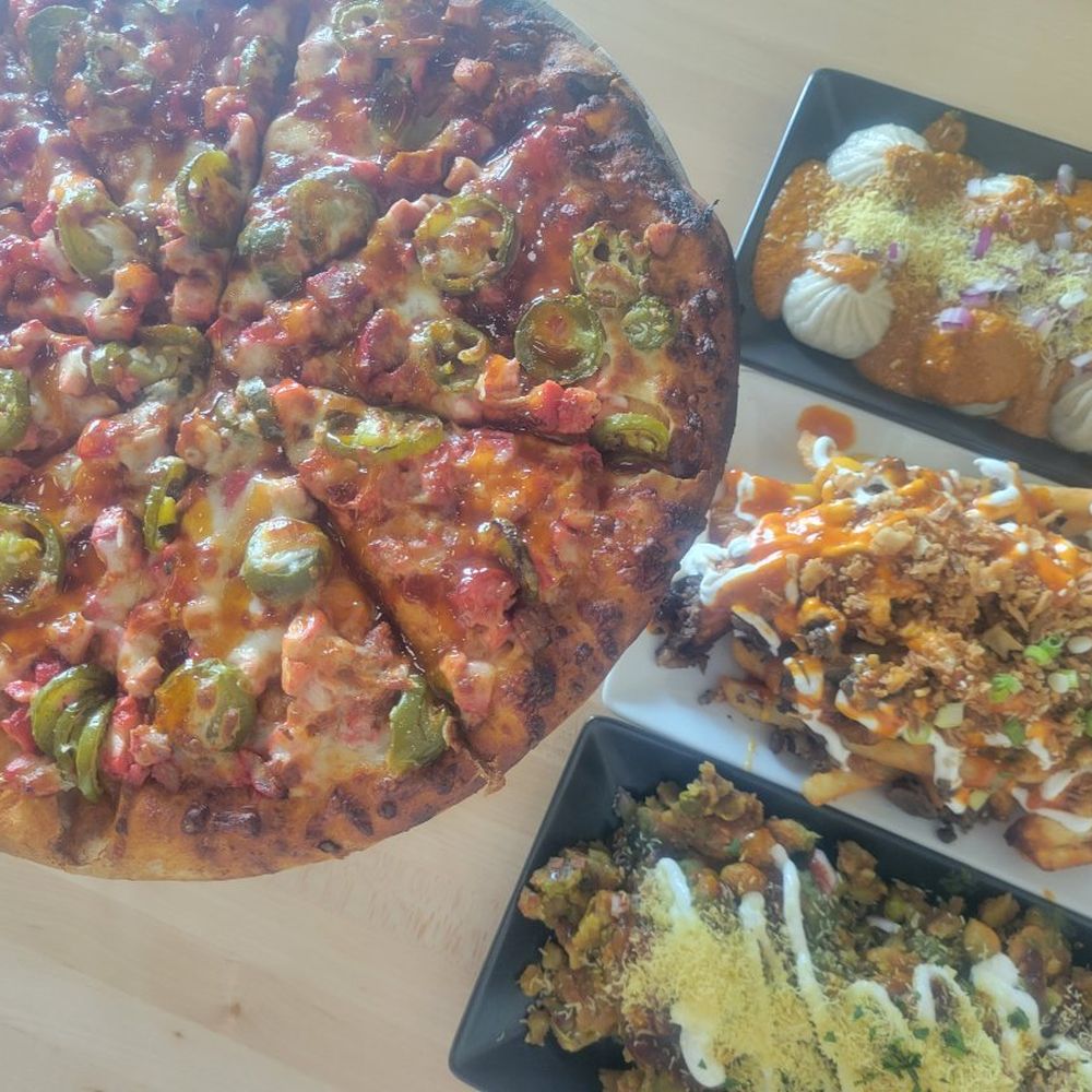 Moti Cafe - Firecracker masala pizza, (from top to bottom) tikka momos, kimchi friends, and samosa chaat. - Indian Near Me - Glenview, Illinois Moti Cafe - Firecracker masala pizza, (from top to bottom) tikka momos, kimchi friends, and samosa chaat. - Indian Near Me - Glenview, Illinois