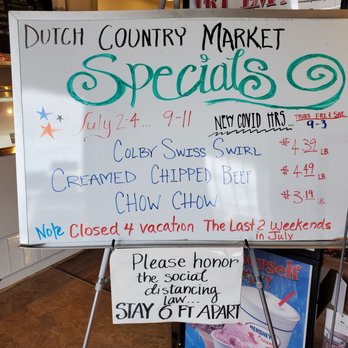 Dutch Country Market - a white board with prices - Delis Near Me - Laurel, Delaware Dutch Country Market - a white board with prices - Delis Near Me - Laurel, Delaware