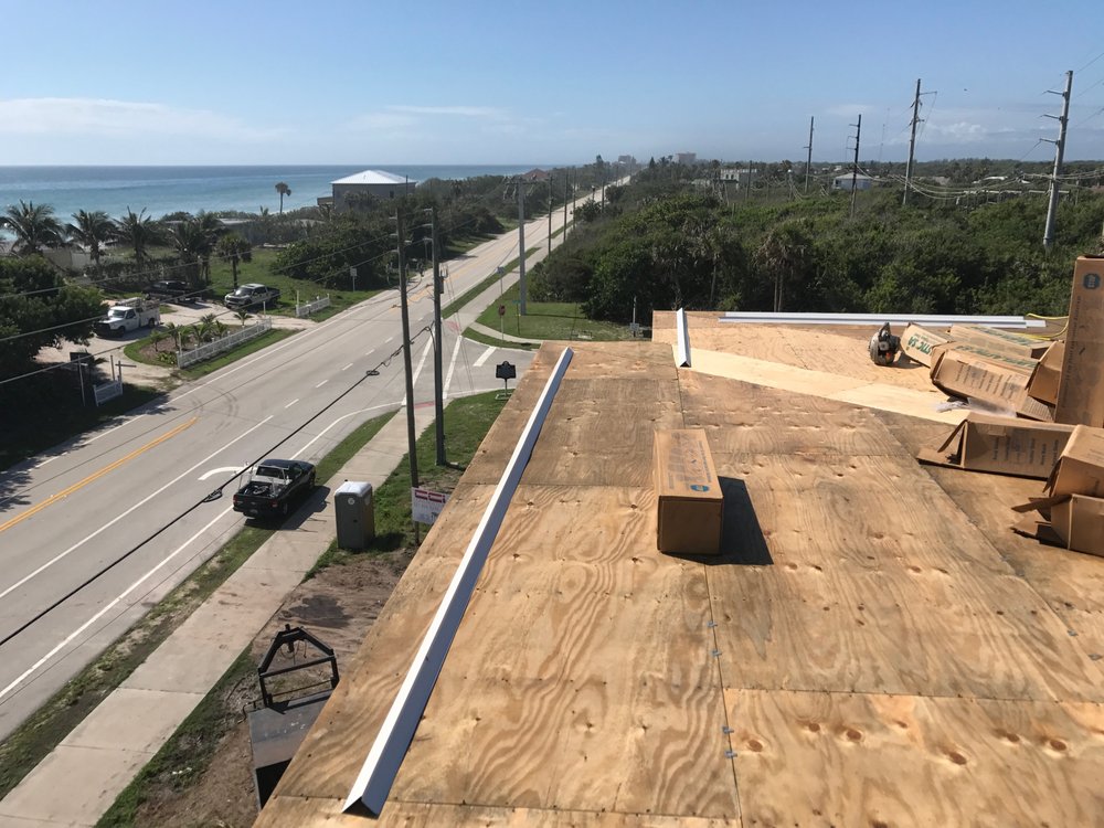 Slide of JVR Roofing