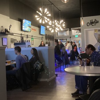 Knapptronix Brewing - a group of people sitting at a table - Breweries Near Me - Lafayette, Indiana