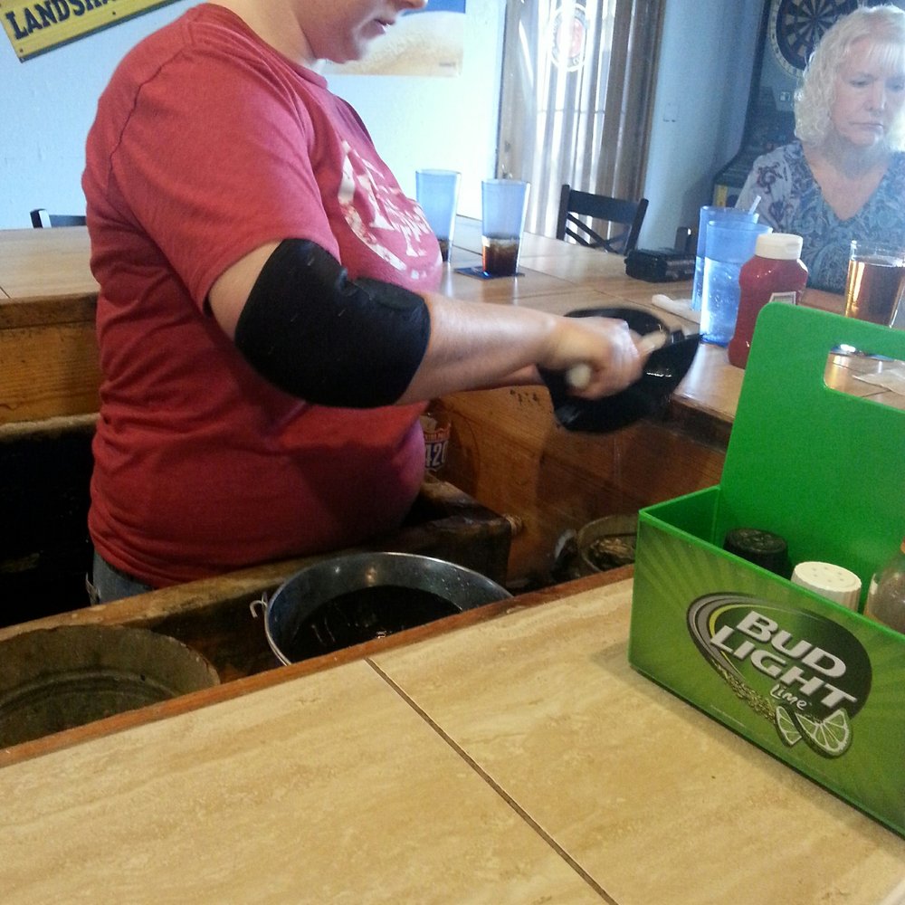 Clermont Oyster Bar - Shucking - Seafood Near Me - Clermont, Florida