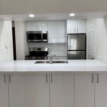 Rostica - Opened up galley kitchen. Added eating counter - Stucco Services Near Me Rostica - Opened up galley kitchen. Added eating counter - Stucco Services Near Me