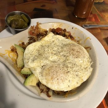 North Point Cafe - Santa Fe skillet. Under the eggs is hashbrowns, chorizo, avocado, onions, etc. usually comes with jalapeños on it I had them put on the side - Breakfast & Brunch Near Me - Denton, Texas North Point Cafe - Santa Fe skillet. Under the eggs is hashbrowns, chorizo, avocado, onions, etc. usually comes with jalapeños on it I had them put on the side - Breakfast & Brunch Near Me - Denton, Texas