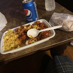 Peking Restaurant - Spicy General chow chicken with pork fried rice, And its pretty good, and also large for the combo with the egg roll!