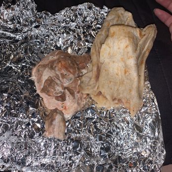 Rubio's Coastal Grill - My squished and empty burrito next to a cheese-less bean & sour cream mix. There's also some of the salsa the burrito comes with. - Mexican Near Me - Anaheim, California Rubio's Coastal Grill - My squished and empty burrito next to a cheese-less bean & sour cream mix. There's also some of the salsa the burrito comes with. - Mexican Near Me - Anaheim, California