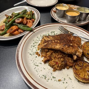 Broussard's Cajun Cuisine - Salmon with jambalaya - Cajun/Creole Near Me - Paducah, Kentucky