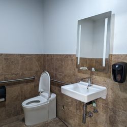Standard Plumbing Supply - Kohler Eir smart toilet, Verdera lighted medicine cabinet, Composed single hole touchless faucet