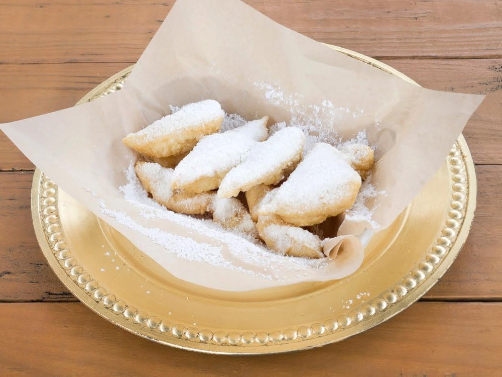 The Taste of Mardi Gras Foods Logo