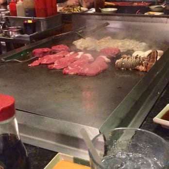 Okinawa - Making everyone's meals at the hibachi table. Yumm! - Japanese Near Me - Fort Walton Beach, Florida Okinawa - Making everyone's meals at the hibachi table. Yumm! - Japanese Near Me - Fort Walton Beach, Florida