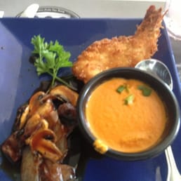Awesome taste of coconut shrimp and steak from Steve's steak house. And the soup is to die for.