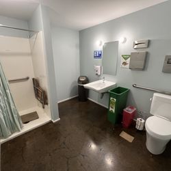 Queermunity - Single-stall bathroom with shower