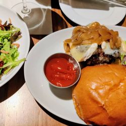 Scarlet Oak Tavern - Brie & carmelized onion burger with side salad.