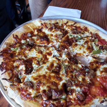 Cask'n Flagon - The Vendor Street Pizza. It was sausage and Peppers. Yummo! - Sports Bars Near Me - Boston, Massachusetts