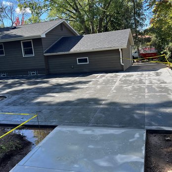 Creative Concrete Inc - Stamped concrete patio & poured concrete driveway installed in White Bear Lake MN by Creative Concrete Inc - General Contractors Near Me - New Brighton, Minnesota Creative Concrete Inc - Stamped concrete patio & poured concrete driveway installed in White Bear Lake MN by Creative Concrete Inc - General Contractors Near Me - New Brighton, Minnesota