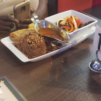 Chloe's - Tassot (fried goat) with rice and beans - Caribbean Near Me - Brooklyn, New York Chloe's - Tassot (fried goat) with rice and beans - Caribbean Near Me - Brooklyn, New York