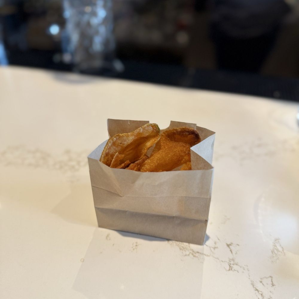 Burtons Grill & Bar - Complimentary potato chips - New American Near Me - Mansfield, Massachusetts Burtons Grill & Bar - Complimentary potato chips - New American Near Me - Mansfield, Massachusetts