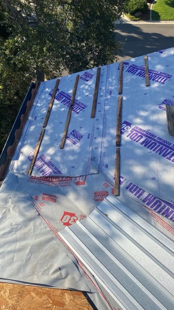 Slide of Frontline Roofing