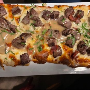 Carnivore - Modiga Flatbread - Steakhouses Near Me - St. Louis, Missouri Carnivore - Modiga Flatbread - Steakhouses Near Me - St. Louis, Missouri