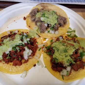 Ponchos Tacos - Trio of tacos (clockwise from the top) - lengua, al pastor and chorizo - Mexican Near Me - Fullerton, California Ponchos Tacos - Trio of tacos (clockwise from the top) - lengua, al pastor and chorizo - Mexican Near Me - Fullerton, California