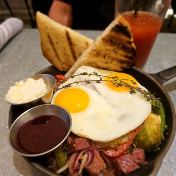 Toast - Corned beef Hash and eggs. Sour dough toast with delicious homemade raspberry preserves. - Breakfast & Brunch Near Me - Temecula, California Toast - Corned beef Hash and eggs. Sour dough toast with delicious homemade raspberry preserves. - Breakfast & Brunch Near Me - Temecula, California
