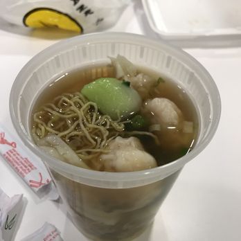 Hong Kong Eatery - Wonton noodle soup in the takeout container, wontons are hidden under noodles - Seafood Near Me - Boston, Massachusetts