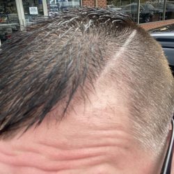Roffler of Moorestown - Unblended uneven fade and hair...choppt hard part uneven